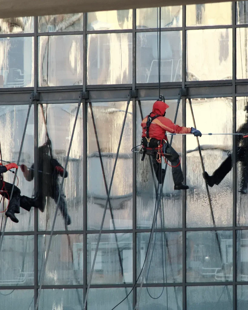 Professional cleaning service worker cleaning a commercial building
